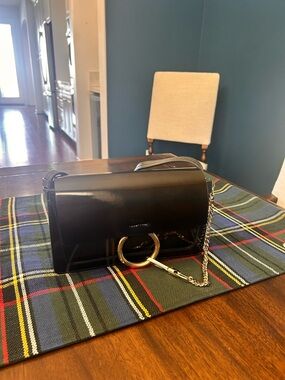 Chloé Black Patent Leather Crossbody with Gold Ring